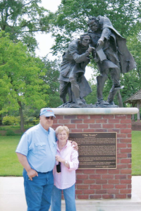 Aunt Joy and Uncle Eddie in front of Chief Bowles and Sam Houston's statue.